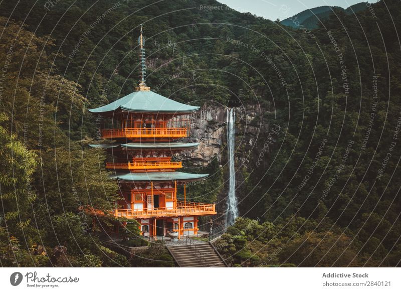 Traditional Asian tower in nature Building asian Nature Green Vantage point Mountain Hill Cliff Rock Plant Beautiful Natural East Tower oriental eastern Pagoda