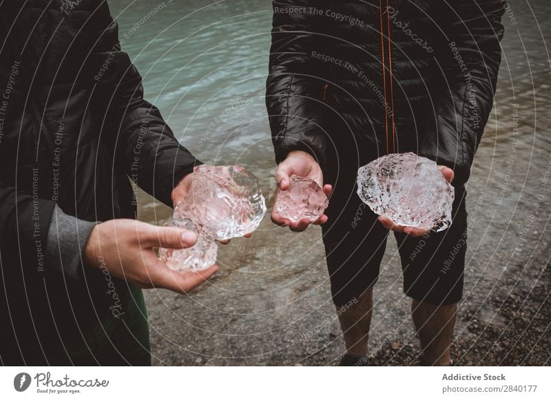 Anonymous people holding ice pieces Human being Ice Piece Crystal Traveling Hold Mountain Glacier Winter Natural Frost Transparent Formation The Arctic