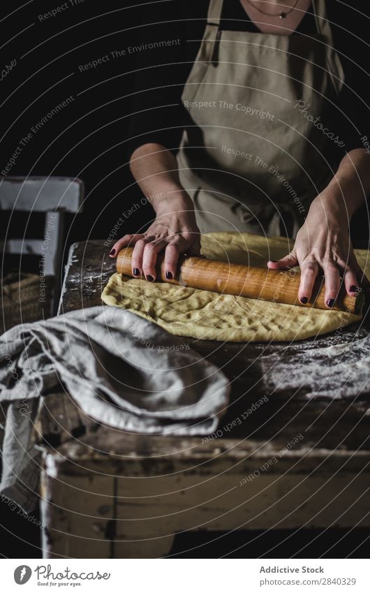 Crop woman kneading dough Human being Cooking Dough Rustic Flour Food rolling Pin chef Bakery Baked goods Table Make Bread Ingredients Preparation Home-made Raw
