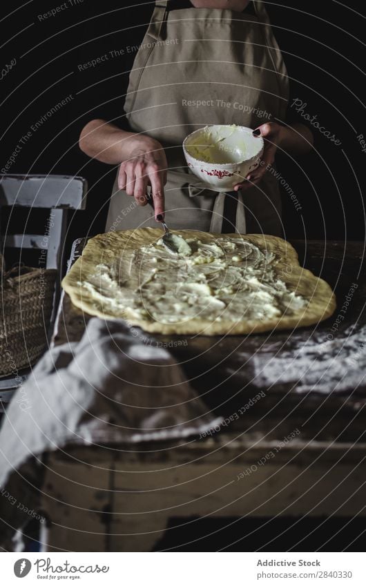 Woman putting stuffing on dough Human being Cooking Dough knead Rustic Flour Food Filling Bowl Putt chef Bakery Baked goods Table Make Bread Ingredients