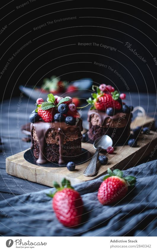 Sweet cakes decorated with berries Baked goods Rustic Delicious Cake Berries served Chocolate appetizing Dessert Food Fresh Tasty Home-made Gourmet Bakery Snack