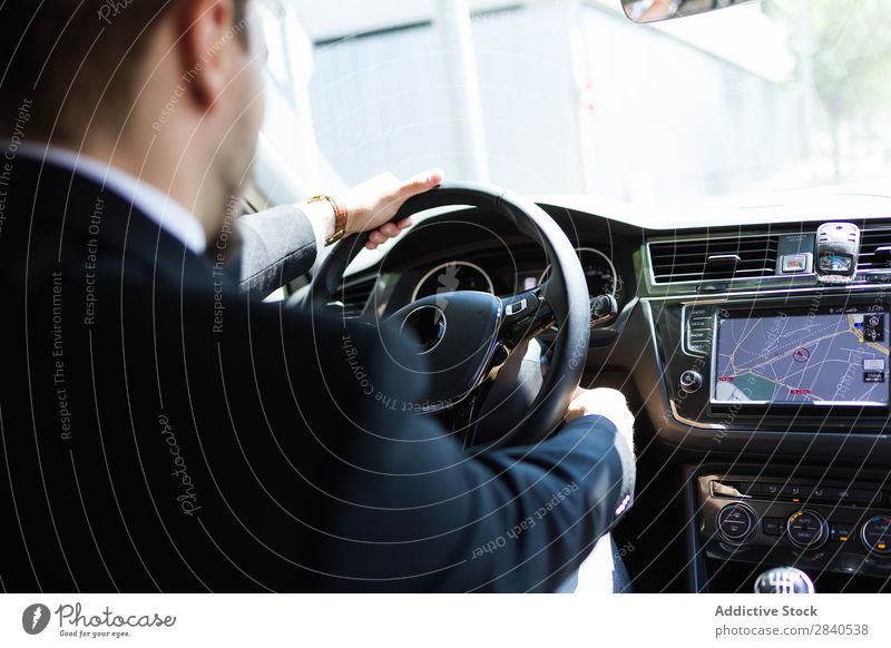 Man using navigator in car Car Navigation Businessman Technology Direction Transport Suit Vacation & Travel Driver touchscreen System Modern Street Vehicle