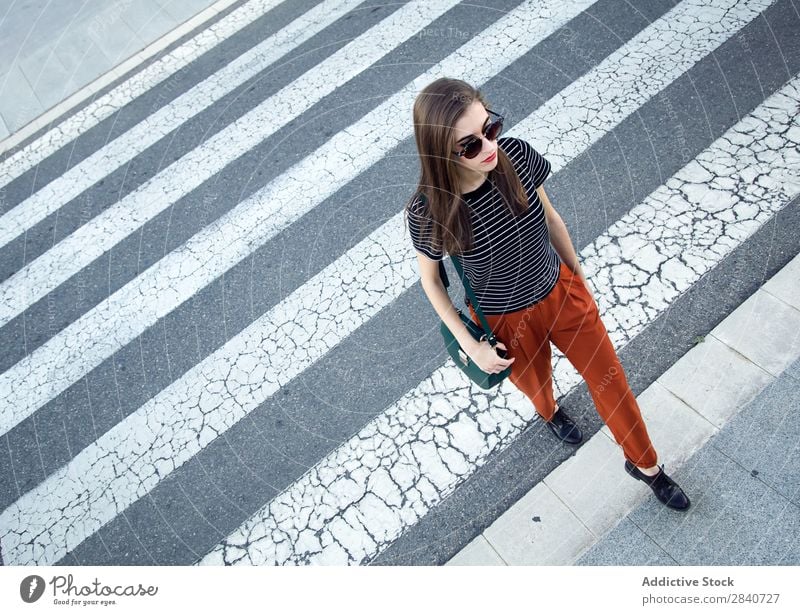 Portrait of beautiful young woman posing in the street. Girl Fashion Model Town Youth (Young adults) Style Easygoing Street Caucasian Portrait photograph