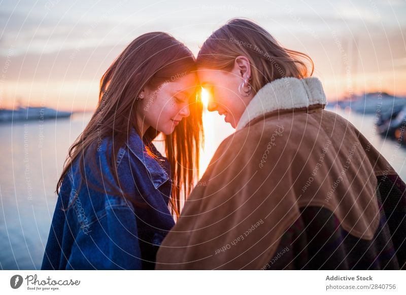 Cute couple of women having fun at sunset Winter Girl Youth (Young adults) Human being Lifestyle Sunset Happy Couple Friendship Woman Together Beautiful Love