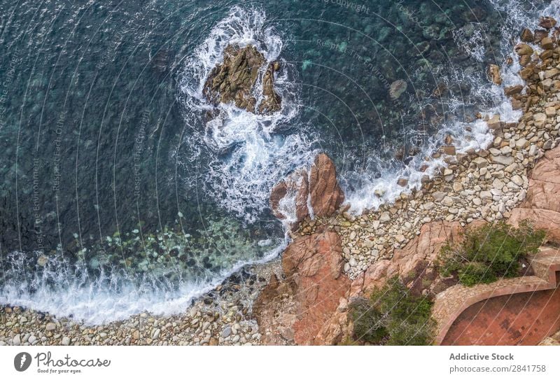 Aerial views of a coastline with waves and rocks Aircraft Background picture Beach Beautiful Blue brava Catalonia Cliff Coast Ribs de Destination girona