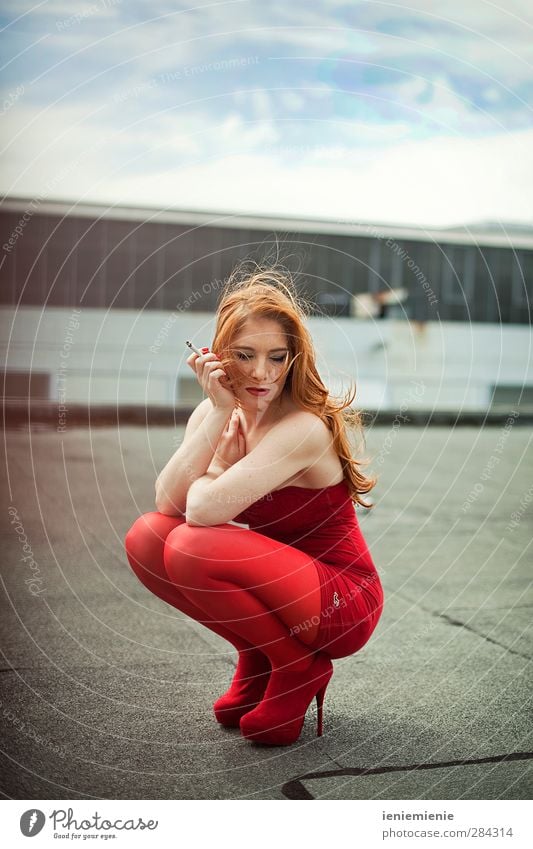 rooftop Style Feminine 1 Human being 30 - 45 years Adults Fashion Clothing Tights High heels Red-haired Emotions Cool (slang) Eroticism Smoking Colour photo
