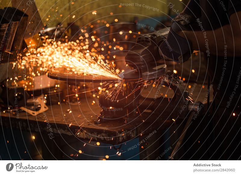 worker using an angle grinder Employees &amp; Colleagues Metal Grinder Corner Spark Technology Power Industry Steel Industrial Tool Electric Factory Blade