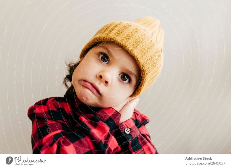 Cute boy grimacing Boy (child) making faces Hat Happy Child Youth (Young adults) Infancy Human being Easygoing Portrait photograph Expression Joy Small