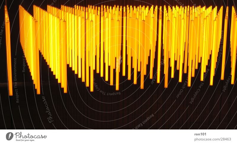magicsticks yellow Lamp Rod Lighting Orange Gold Glowstick Strip of light Light object Luminosity Dark background Yellow-orange Symmetry Geometry Arrangement
