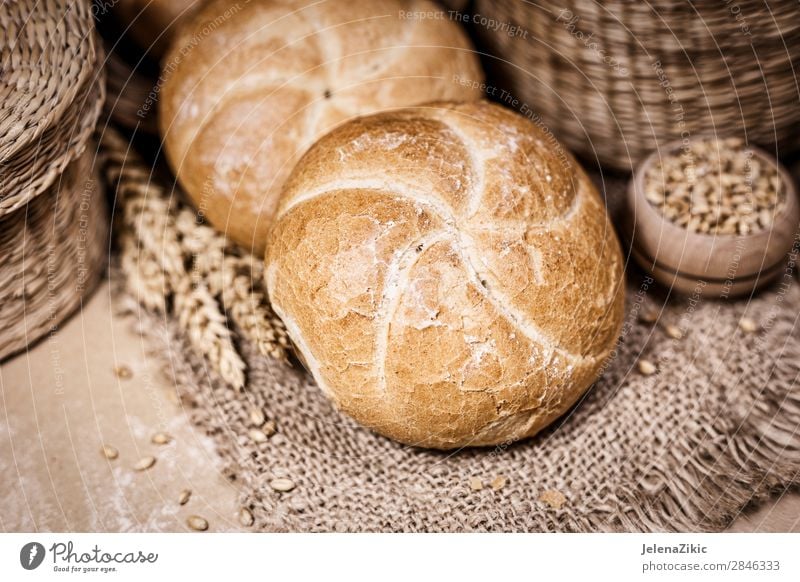 Fresh bread and wheat on a rustic background Food Dough Baked goods Bread Nutrition Eating Breakfast Lunch Dinner Buffet Brunch Organic produce Healthy Eating