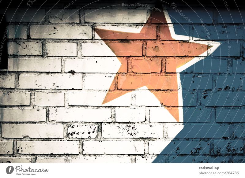 R136a1 Deserted Wall (barrier) Wall (building) Facade Sign Graffiti Blue Yellow White Star (Symbol) Graphic Colour photo Exterior shot Pattern