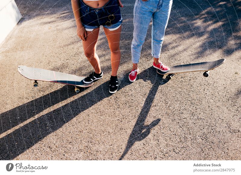 Crop women on skates Youth (Young adults) Skateboard Town Posture Summer Independence Girl Self-confident Sports Skateboarding Hip & trendy Uniqueness