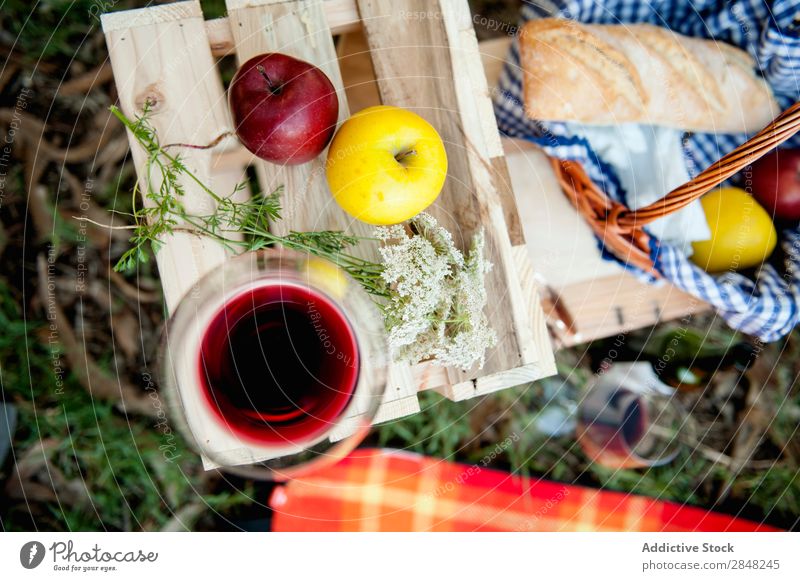Wineglass and apples Wine glass Apple Picnic Food Flower Box Red Summer Basket Fruit Park Bread Meal Grass Glass Spring Lunch Leisure and hobbies romantic