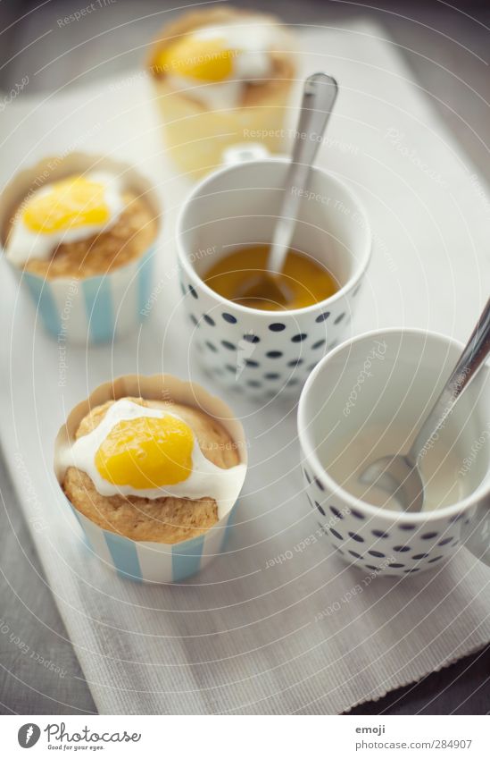 Fried Eggs-Cupcakes Dough Baked goods Dessert Muffin Cream topping Fried egg sunny-side up Nutrition Finger food Delicious Yellow Colour photo Interior shot