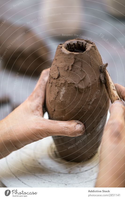 Close-up of clay vase on wheel Woman Workshop shaping Vase Earthenware Clay Pot Structures and shapes Tradition Material skill Master Crockery Craftsman