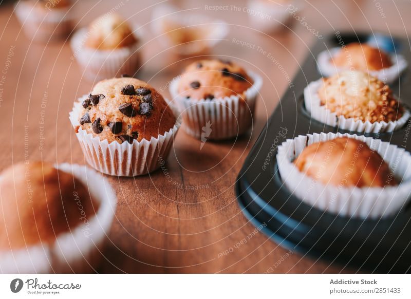 Home Made Muffins with Chocolate Seeds Brown Sweet Dessert Coffee Cake Fresh Cup Home-made Cupcake Tasty Dark Table Breakfast Baking Token Cinnamon Delicious