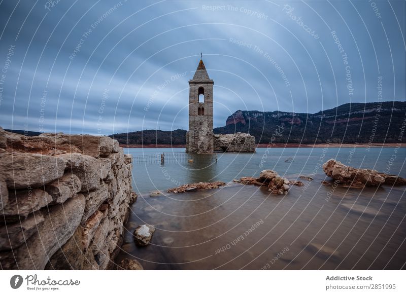 Bell tower submerged in a lake Lake Water Tower Church Vacation & Travel Architecture Landmark Sky Old Mountain Landscape Nature Spain Catalonia sau Blue