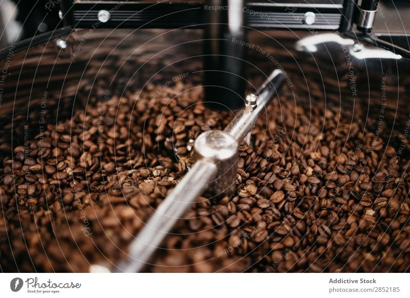 Close-up coffee grinding machine Coffee Grind Grinder Beans Espresso Brown Roasted Café Drinking Breakfast Caffeine Shopping Aromatic Dark Natural Professional