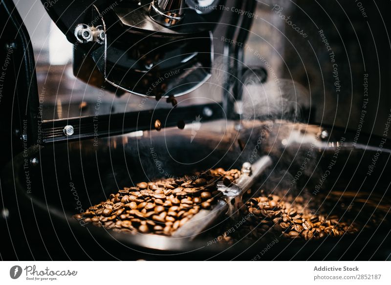 Close-up coffee grinding machine Coffee Grind Grinder Beans Espresso Brown Roasted Café Drinking Breakfast Caffeine Shopping Aromatic Dark Natural Professional