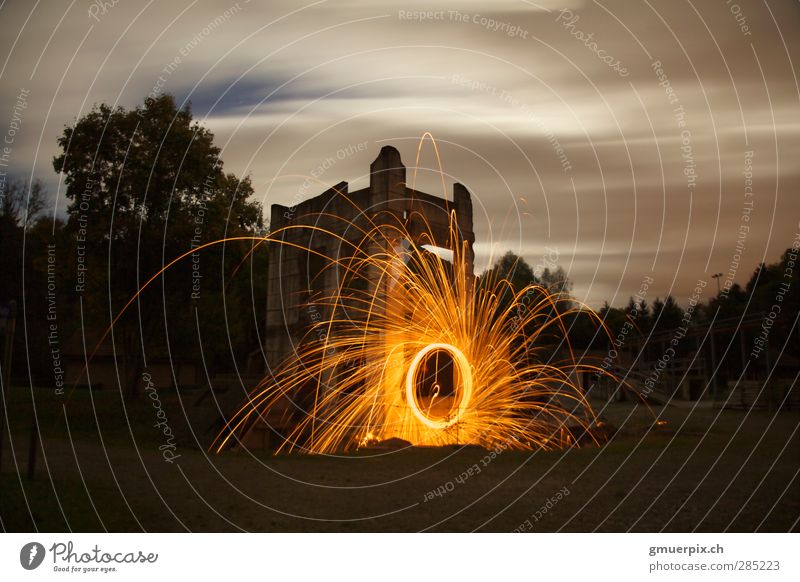 Fire circle at the tower Art Nature Earth Sky Storm clouds Night sky Summer Deserted Tower Manmade structures Wall (barrier) Wall (building) Adventure Passion