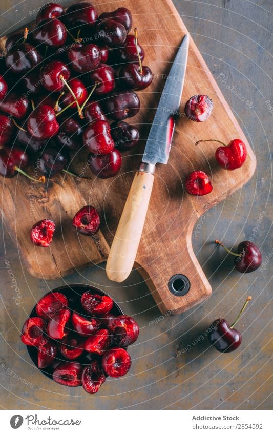 Cherries in a wooden cutting board black cherry Bowl Cherry Chopping board Delicious Dessert Food Fresh Fruit Healthy Juicy Knives Organic Raw Red Spring Sweet