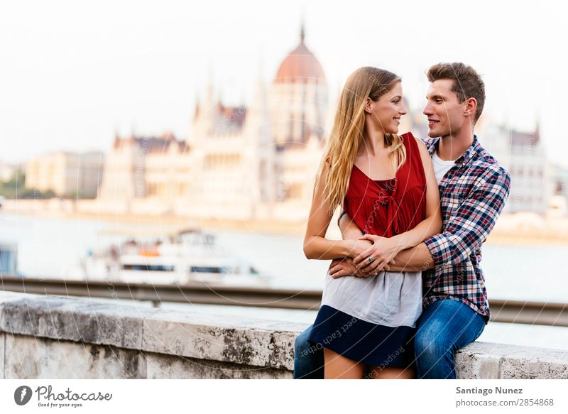 Young loving couple hugging in Budapest City. Couple Love Woman Relationship Youth (Young adults) Beautiful Embrace Romance Happiness Kissing romantic Tourist