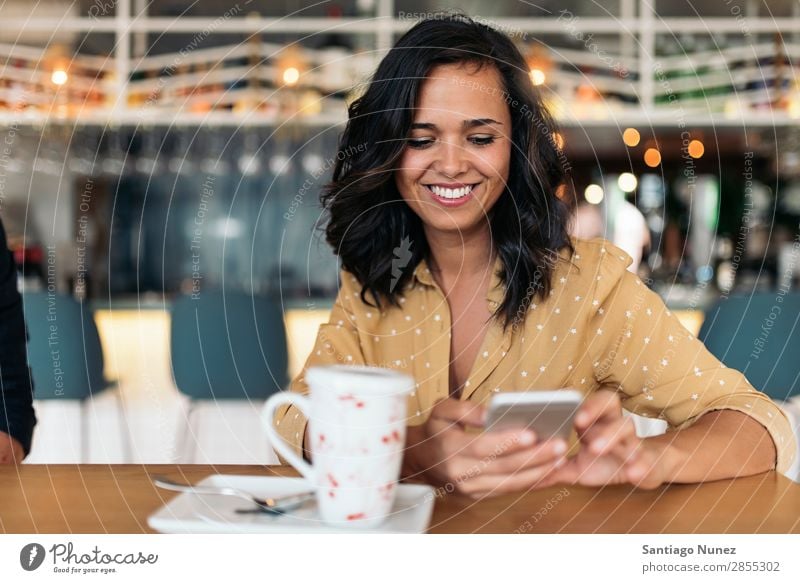 Portrait of beautiful woman using mobile. Woman Café Break Coffee Sit device Telephone Business 1 Beautiful pretty PDA Hold Mobile Smiling Lifestyle Human being
