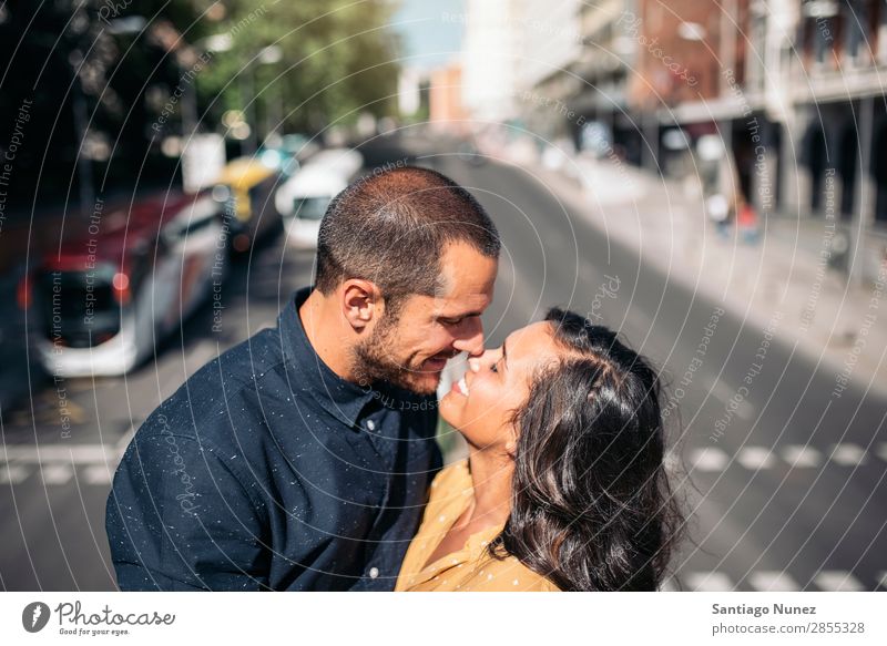 Smiling couple of lovers having fun. Woman Date Love Embrace Kissing Man Girl Youth (Young adults) Romance Couple City Happiness Happy Human being Together