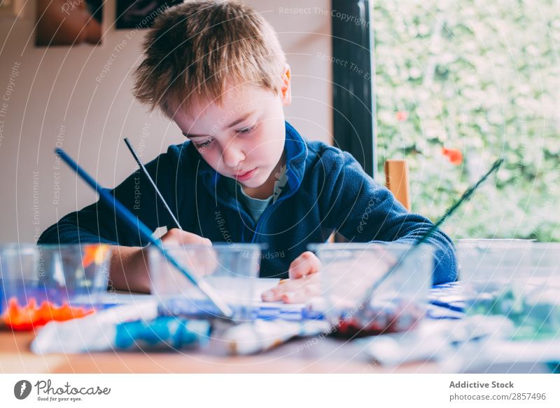 Blonde young boy painting with acrilics Art Artist Boy (child) Carbon Colour Multicoloured Craft (trade) Creativity Drawing Child Painting (action, artwork)
