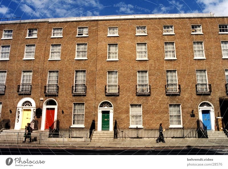 Front of houses in Dublin Doorframe Multicoloured Brick Building House (Residential Structure) Brick-built house Red Yellow Green Window Architecture Ireland
