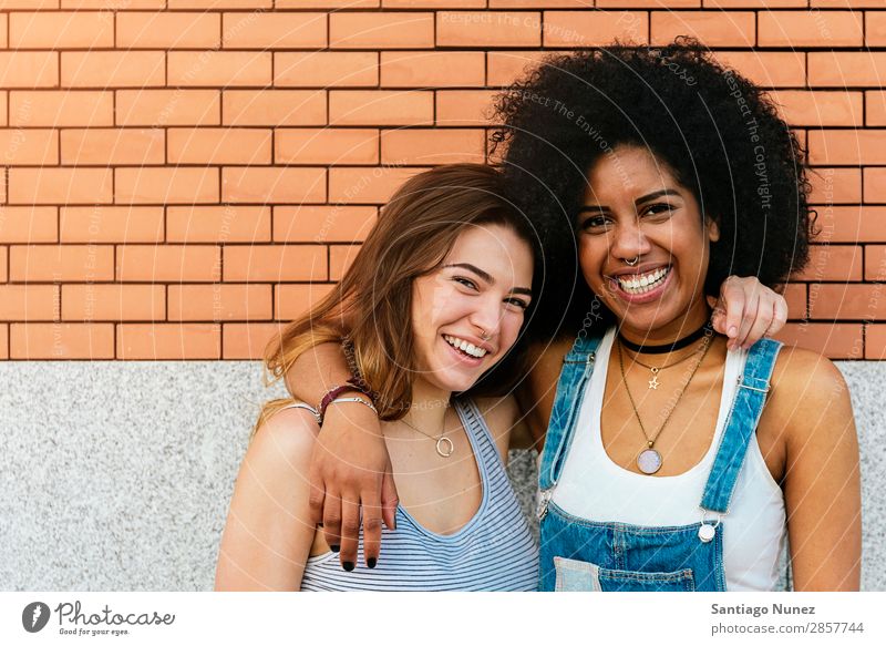 Portrait of a beautiful black women in the street. Woman Friendship Youth (Young adults) Happy Summer Portrait photograph Human being Joy Smiling Walking Racism