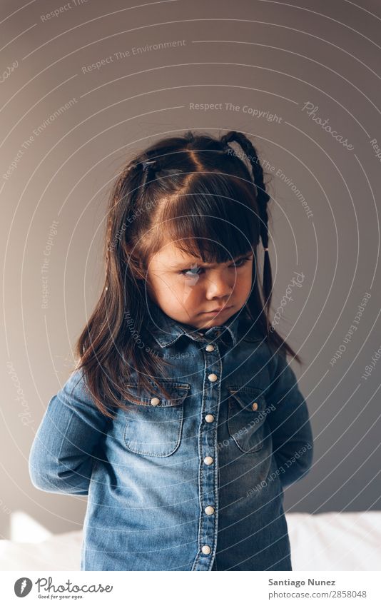 Portrait of beautiful sad girl. Girl Anger Crossed Child Portrait photograph portraiture Small Sadness Arm Lifestyle pretty sorry pouting Beautiful Human being