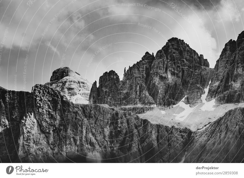 Mountain range with clouds in Dolomites in black and white Tourism Structures and shapes Copy Space bottom Vacation & Travel Light Copy Space right Shadow