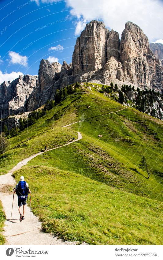 Hiking trail with hiker with panoramic view in the Dolomites Tourism Structures and shapes Copy Space bottom Vacation & Travel Light Copy Space right Shadow