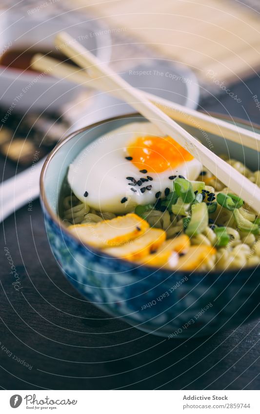 Ramen with noodles, egg and scallion asian Bowl Chopstick Dish Egg Food Healthy Hot Ingredients Japanese Meat Pork ramen Sauce Sesame Soup soy Spoon Vegetable
