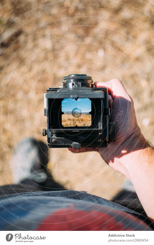 Landscape through the viewfinder of an old camera Analog analogical Camera collectable Film Hand Hold Lens Medium format Old fashioned Exterior shot Photography