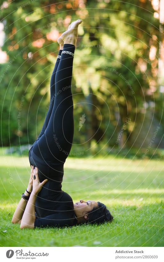 Young woman practicing yoga outdoors Action Loneliness asana Balance Beautiful Brunette Day Woman Fitness Girl Green Plant Healthy Lifestyle Meditation Nature