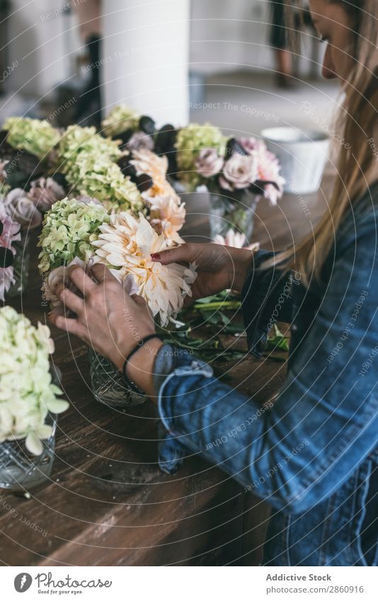 Woman near table with bouquets of blooms in vases Flower Bouquet Vase Table Plant Chrysanthemum Rose Twig Happy Fresh bunch Leaf Wood Lady Branch Bud Nature