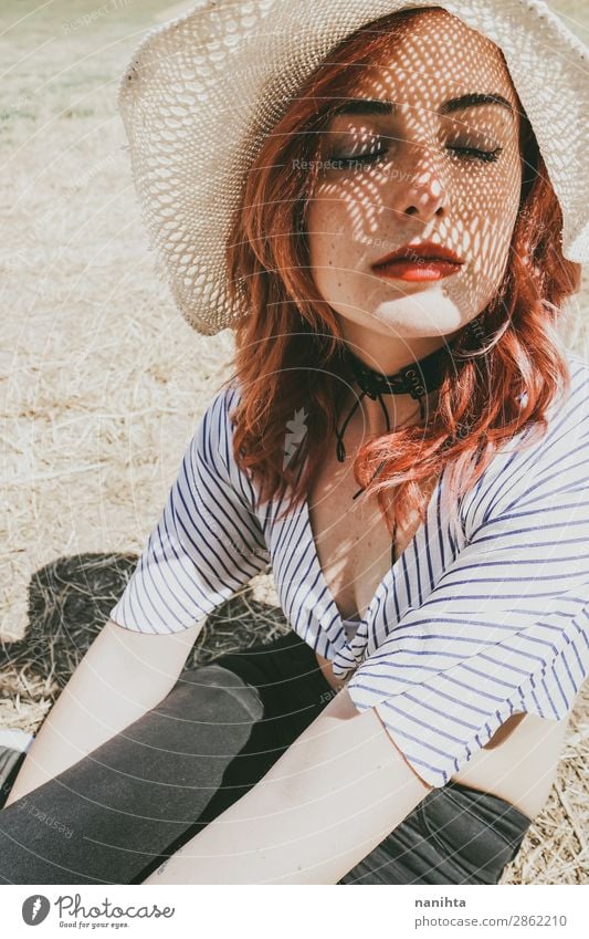 Redhead model protecting herself from sun Lifestyle Elegant Style Beautiful Skin Face Cosmetics Senses Relaxation Calm Vacation & Travel Summer Sun Sunbathing