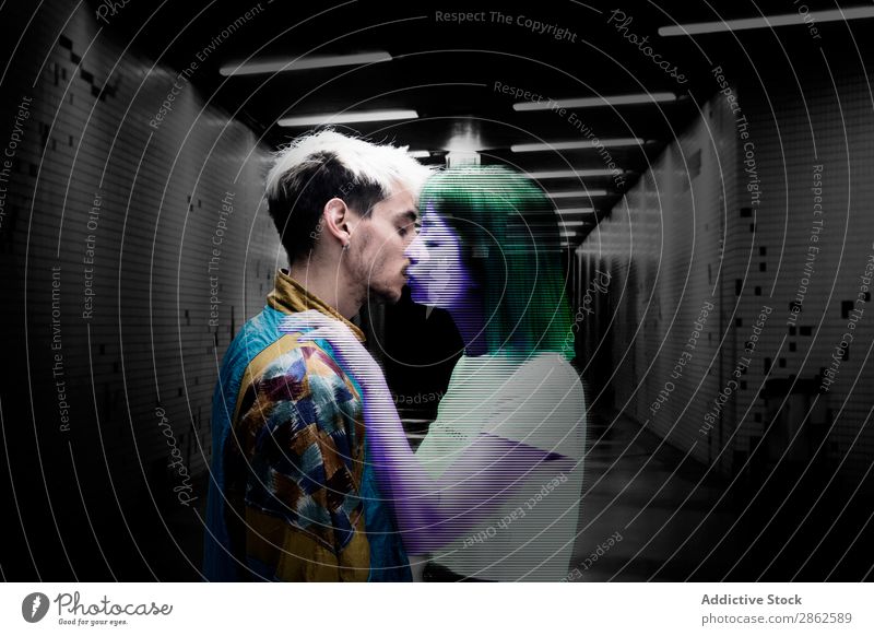 Man kissing with holographic girl Couple Virtual Kissing augmented Conceptual design Love Relationship Invisible Effect Art Affection Digital Illumination