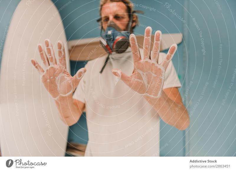 Man in respirator showing hands in dust Hand Dust Workshop Surfboard Indicate Wood Palm of the hand carpentry Workplace Breather Carpenter Tool Weapon