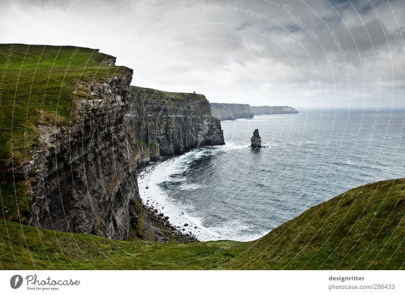 rough country Vacation & Travel Adventure Environment Water Clouds Gale Grass Hill Rock Mountain Cliff Coast Ocean Atlantic Ocean Cliffs of Moher Ireland Threat