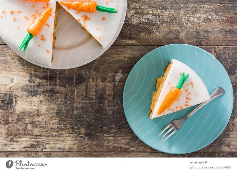 Sweet carrot cake slice on wooden table Carrot Baked goods Cake Pie Candy Dessert Food Healthy Eating Food photograph Orange Vegetable Home-made Cream Cheese