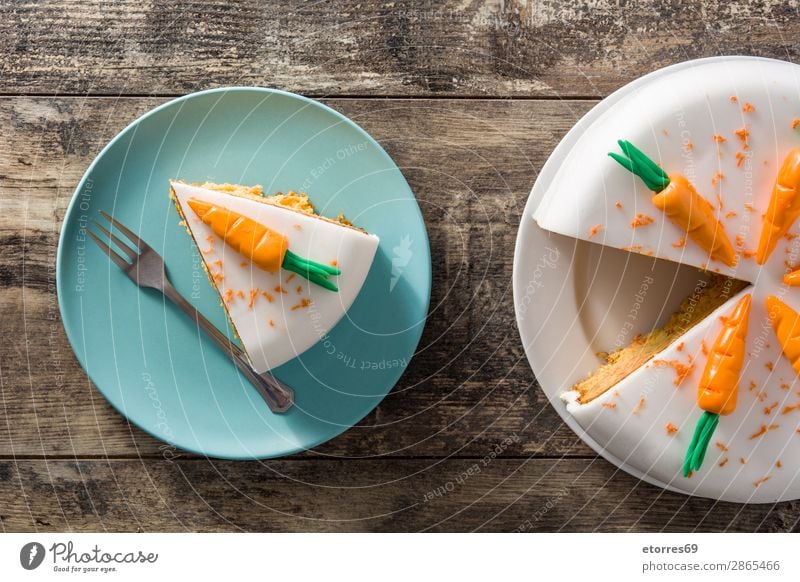Sweet carrot cake slice on wooden table Carrot Baked goods Cake Pie Candy Dessert Food Healthy Eating Food photograph Orange Vegetable Home-made cream Cheese