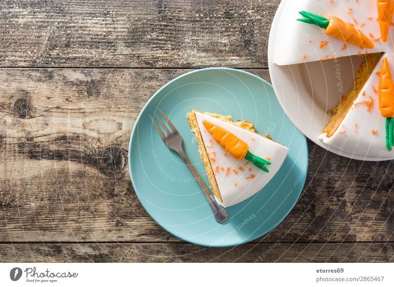 Sweet carrot cake slice on wooden table Carrot Baked goods Cake Pie Candy Dessert Food Healthy Eating Food photograph Orange Vegetable Home-made Cream Cheese