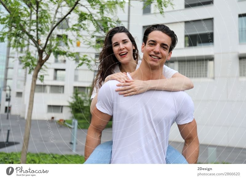 Beautiful young couple hugging, looking at camera Style Joy Happy Summer Flirt Human being Masculine Feminine Young woman Youth (Young adults) Young man Woman