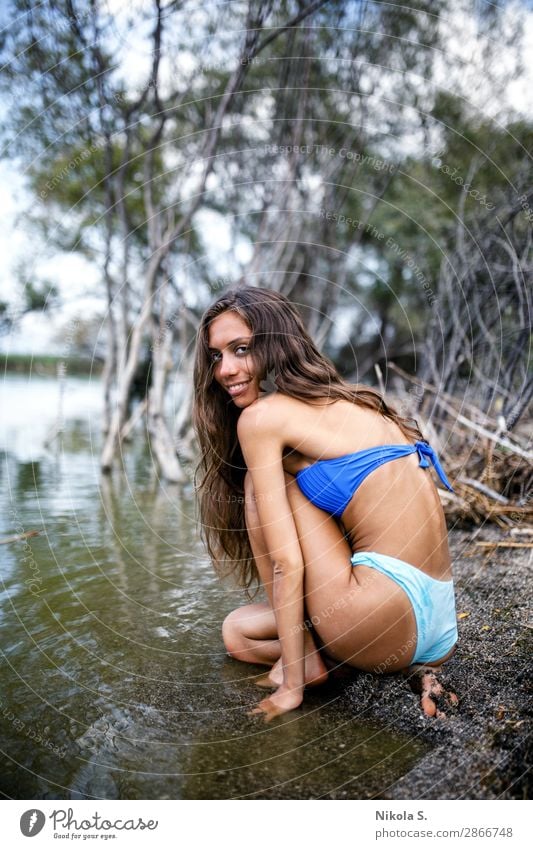 Joseph Banks Acelerar Opresor sexy girl in bikini on a tiny beach in tropical swamp environment - a  Royalty Free Stock Photo from Photocase