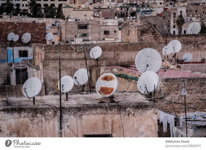 Many antennas on roofs on old buildings in city Antenna Roof Building City Old Marrakesh Morocco Satellite House (Residential Structure) Ancient Town