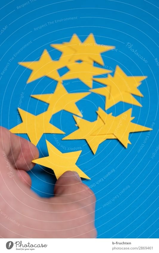 sort yellow stars Economy Advertising Industry Gastronomy Business Career Success Fingers Stars Paper Decoration Sign Select Movement To hold on Blue Yellow