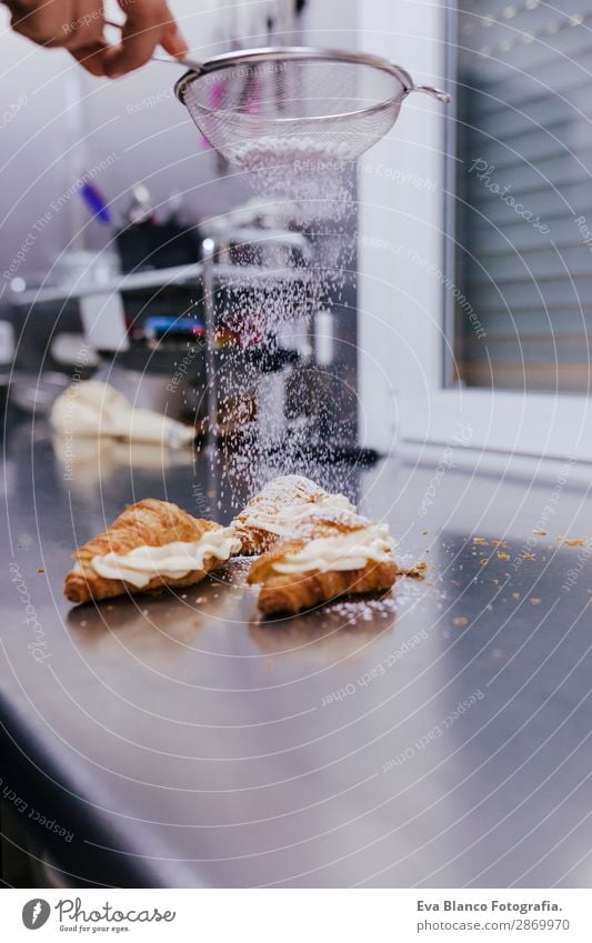 woman hands sprinkling white flour over croissants Dough Baked goods Bread Roll Croissant Nutrition Kitchen Human being Feminine Woman Adults Arm Hand 1